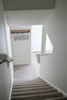 Apartment 105: Stairway From the Second Floor Bedrooms to the Main Floor